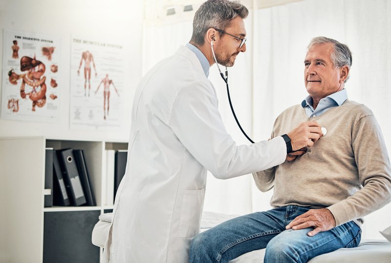 Elderly patient with doctor for a check up