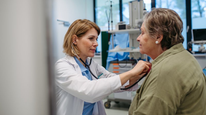 Middle-aged woman with female doctor